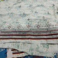 لباس فروشیه نیمه کاره پشتش درحال|لباس|ایرانشهر, |دیوار