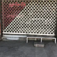یک باب مغازه بر خیابان اصلی امام