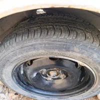 یک جفت چراغ هدلایت و چهار حلقه لاستیک 14|قطعات یدکی و لوازم جانبی|جوانرود, |دیوار