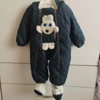 کاپشن نوزادی ،به همراه یک روروئک اصلا استفاده نشده