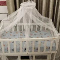 تخت گهواره کنار مادر