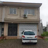 ساختمان همراه با مغازه