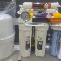 تعویض فیلتر دستگاه تصفیه اب