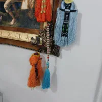 عروسک و تسبیح