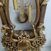 ساعت چوبی ورق طلا