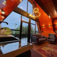 کلبه سوئیسی جکوزی دار|اجارهٔ کوتاه‌مدت ویلا و باغ|شیرگاه, |دیوار