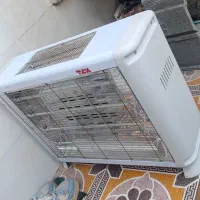 دو عدد بخاری یکی برقی و دیگری گازی
