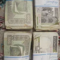 چند بسته ۱۰۰ تایی اسکناس ۵۰ تومانی