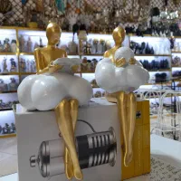 دکوری مدرن کادویی سیسمونی جهیزیه مجسمه دختر ابری