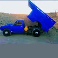 نیسان کمپرسی حمل خاک نخاله ساختمانی همراه با کارگر