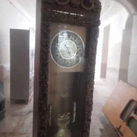 ساعت و بوفه و میز تلویزیون