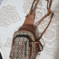 کوله آکبند تینیجر برند کوچ