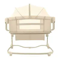 گهواره‌ و تخت برقی کنار مادر سه کاره