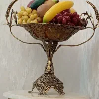 میوه خوری برنجی با میوه های مصنوعی