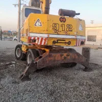 بیل میکانیکی  ۹۱۲ هپکو|خودرو سنگین|رباط‌کریم, رباط‌کریم|دیوار