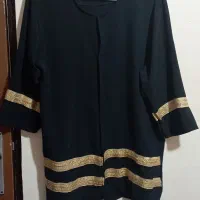 تعداد زیادی مانتو و لباس مجلسی