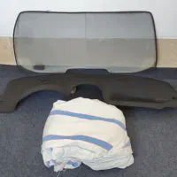 چادر ماشین.روداشبوردی،چراغ جلو و مقداری وسایل ۲۰۶