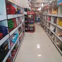 صندوق دار در فروشگاه لوازم قنادی