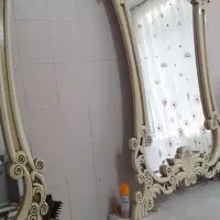 اینه و صندلی جلو اینه