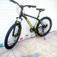 دوچرخه مشکی زرد قناری نو اکبند