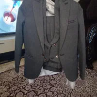 کت و شلوار پسرانه معاوضه دارم