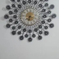 باسلام یک عدد ساعت فلزی در حد نو