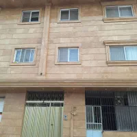 یک واحد آپارتمان ومغازه تجاری