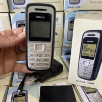 نوکیا 1200 اصلی قدیمی شکلک دار دکمه ای آکبند nokia|موبایل|تهران, جمالزاده|دیوار