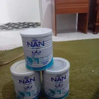 باسلام تعدادی قوطی شیرخشگ