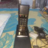 تلفن بیسیم قدیمی و اسپیکر و دیجیتال تلویزیون