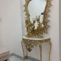 اینه شمعدان و ساعت رومیزی