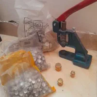 دستگاه پرس دکمه