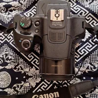 دوربین کانن Canon sx60 HS معاوضه با ایفون|دوربین عکاسی و فیلم‌برداری|قم, شهرک قدس|دیوار