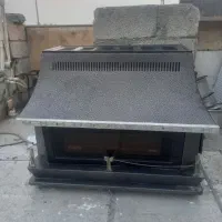 بخاری گازی طرح شومینه مارک طلائی در حد نو