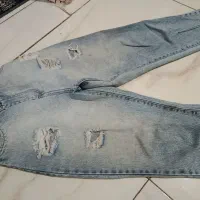 شلوالی آبی مام فیت زاپ دار