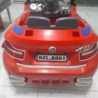 ماشین شارژی کودک.کنترل دار۲موتوره.شاسی بلندزیرقیمت