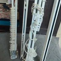 ساعت و چوب پرده