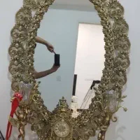 اینه و شمعدان برنجی