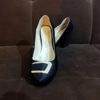 کفش مجلس|کیف، کفش، کمربند|خوی, |دیوار
