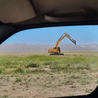راننده بیل میکانیکی