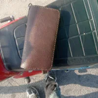 کیف مدارک رنگ قهوه‌ای پیدا شده