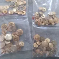 دگمه لباس زنانه مردانه