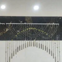 لوستر کریستال و پرده کریستال