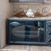 آون توستر با جوجه گردان و دو سینی کاملاً سالم