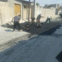 کارگر آسفالتی میخام