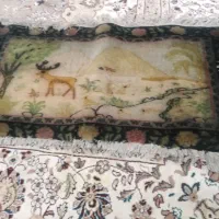 یک عدد قالیچه دستی