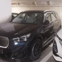 BMW ix1 با کیت ام 2025 کربن بلک صفر