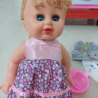 عروسک موزیکال و کوله