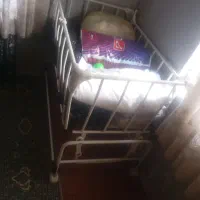 تخت خواب و ننوی کودک