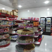 فروش قفسه فروشگاهی و استند شکلات و پفک